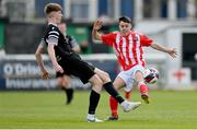 15 April 2023; Ben Heinen of College Corinthians in action against Brian O'Meara of St Joseph’s during the FAI Youth Cup Final match between St Joseph’s AFC, Dublin, and College Corinthians AFC, Cork, at the Carlisle Grounds in Bray, Wicklow. Photo by Seb Daly/Sportsfile