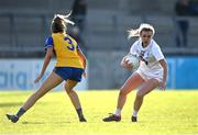 16 April 2023; Ciara Price of Kildare in action against Siofra Ní Chonaill of Clare during the 2023 Lidl Ladies National Football League Division 3 Final match between Clare and Kildare at Parnell Park in Dublin. Photo by Piaras Ó Mídheach/Sportsfile