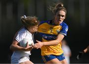 16 April 2023; Róisín Byrne of Kildare in action against Siofra Ní Chonaill of Clare during the 2023 Lidl Ladies National Football League Division 3 Final match between Clare and Kildare at Parnell Park in Dublin. Photo by Piaras Ó Mídheach/Sportsfile