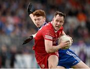16 April 2023; Kieran McGeary of Tyrone in action against Sean Jones of Monaghan during the Ulster GAA Football Senior Championship Quarter-Final match between Tyrone and Monaghan at O'Neill's Healy Park in Omagh, Tyrone. Photo by Sam Barnes/Sportsfile