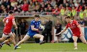 16 April 2023; Stephen O’Hanlon of Monaghan in action against Conor Meyler of Tyrone during the Ulster GAA Football Senior Championship Quarter-Final match between Tyrone and Monaghan at O'Neill's Healy Park in Omagh, Tyrone. Photo by Ramsey Cardy/Sportsfile