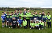 17 April 2023; Uachtarán Chumann Lúthchleas Gael Larry McCarthy, centre, alongside Minister for Public Health, Wellbeing and the National Drugs Strategy Hildegarde Naughton TD, and Head of Healthy Ireland Tom James and Oran GAA players at the announcement of the Healthy Ireland GAA Clubs walking tracks upgrade grants at Oran Gaelic Football Club in Rockfield, Roscommon. Photo by David Fitzgerald/Sportsfile