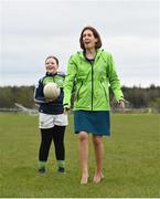 17 April 2023; Minister for Public Health, Wellbeing and the National Drugs Strategy Hildegarde Naughton TD, with Oran GAA players Sheena Harrington, age 11, at the announcement of the Healthy Ireland GAA Clubs walking tracks upgrade grants at Oran Gaelic Football Club in Rockfield, Roscommon. Photo by David Fitzgerald/Sportsfile