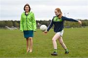 17 April 2023; Minister for Public Health, Wellbeing and the National Drugs Strategy Hildegarde Naughton TD, with Oran GAA player Laura Donnellan, age 12, at the announcement of the Healthy Ireland GAA Clubs walking tracks upgrade grants at Oran Gaelic Football Club in Rockfield, Roscommon. Photo by David Fitzgerald/Sportsfile