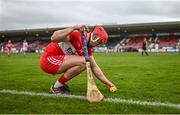 16 April 2023; John Mullan of Derry positions the sliotar before a sideline cut during the Christy Ring Cup Round One match between Tyrone and Derry at O'Neill's Healy Park in Omagh, Tyrone. Photo by Ramsey Cardy/Sportsfile