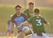 18 April 2023; Ross Keogh of Dublin in action against Liam Kelly of Meath during the Eirgrid Leinster GAA Football U20 Championship Semi-Final match between Meath and Dublin at Páirc Tailteann in Navan, Meath. Photo by Seb Daly/Sportsfile