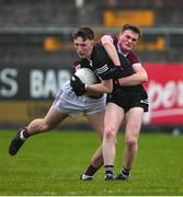 19 April 2023; Dylan McLoughlin of Sligo in action against Charlie Power of Galway during the EirGrid Connacht GAA Football U20 Championship Final match between Galway and Sligo at Tuam Stadium in Galway. Photo by Ray Ryan/Sportsfile