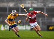 19 April 2023; Ben Cunningham of Cork in action against Ian MacNamara of Clare during the oneills.com Munster GAA Hurling U20 Championship Round 4 match between Clare and Cork at Cusack Park in Ennis, Clare. Photo by John Sheridan/Sportsfile