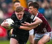 19 April 2023; Luke Casserly of Sligo in action against Mathew Thompson of Galway during the EirGrid Connacht GAA Football U20 Championship Final match between Galway and Sligo at Tuam Stadium in Galway. Photo by Ray Ryan/Sportsfile