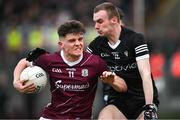 19 April 2023; Cillian O Curraoin of Galway in action against Ross Doherty of Sligo during the EirGrid Connacht GAA Football U20 Championship Final match between Galway and Sligo at Tuam Stadium in Galway. Photo by Ray Ryan/Sportsfile