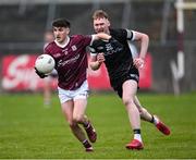 19 April 2023; Luc O'Connor of Galway in action against Brian Byrne of Sligo during the EirGrid Connacht GAA Football U20 Championship Final match between Galway and Sligo at Tuam Stadium in Galway. Photo by Ray Ryan/Sportsfile