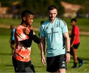 20 April 2023; Leinster Rugby players, together with Emirates Lions Community Rugby Officers, delivered a coaching clinic to the under-16 and under-19 teams, pictured is Leinster Rugby player Nick McCarthy with student Olwam Mndawo at Allen Glen High School in Johannesburg, South Africa. Photo by Harry Murphy/Sportsfile
