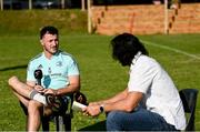 20 April 2023; Leinster Rugby players, together with Emirates Lions Community Rugby Officers, delivered a coaching clinic to the under-16 and under-19 teams, pictured is Leinster Rugby player Will Connors speaking with former Springbok Victor Matfield at Allen Glen High School in Johannesburg, South Africa. Photo by Harry Murphy/Sportsfile