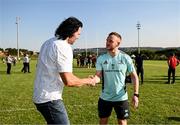20 April 2023; Leinster Rugby players, together with Emirates Lions Community Rugby Officers, delivered a coaching clinic to the under-16 and under-19 teams, pictured Leinster Rugby player Nick McCarthy meets former Springbok captain Victor Matfield at Allen Glen High School in Johannesburg, South Africa. Photo by Harry Murphy/Sportsfile