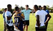 20 April 2023; Leinster Rugby players, together with Emirates Lions Community Rugby Officers, delivered a coaching clinic to the under-16 and under-19 teams, pictured is Leinster Rugby player Brian Deeny with students at Glen Allen Glen School in Johannesburg, South Africa. Photo by Harry Murphy/Sportsfile