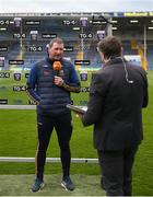21 April 2023; Tipperary manager Brendan Cummins is interviewed by Micheál Ó Domhnaill of TG4 before the oneills.com Munster GAA Hurling U20 Championship Round 4 match between Tipperary and Limerick at FBD Semple Stadium in Thurles, Tipperary. Photo by Stephen Marken/Sportsfile