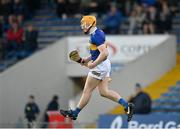 21 April 2023; Sean Kenneally of Tipperary celebrates after scoring his side's first goal during the oneills.com Munster GAA Hurling U20 Championship Round 4 match between Tipperary and Limerick at FBD Semple Stadium in Thurles, Tipperary. Photo by Stephen Marken/Sportsfile