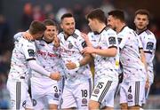 21 April 2023; Paddy Kirk, second from left, celebrates with Bohemians team-mates after scoring their side's first goal during the SSE Airtricity Men's Premier Division match between Drogheda United and Bohemians at Weaver's Park in Drogheda, Louth. Photo by Stephen McCarthy/Sportsfile