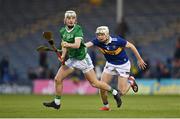 21 April 2023; Con Hayes  of Limerick in action against Joe Caesar of Tipperary during the oneills.com Munster GAA Hurling U20 Championship Round 4 match between Tipperary and Limerick at FBD Semple Stadium in Thurles, Tipperary. Photo by Stephen Marken/Sportsfile