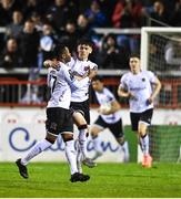 21 April 2023; Rayhan Tullock of Dundalk celebrates with team mate Archie Davies after scoring their side's first goal during the SSE Airtricity Men's Premier Division match between Shelbourne and Dundalk at Tolka Park in Dublin. Photo by David Fitzgerald/Sportsfile