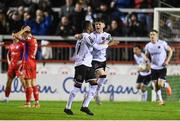 21 April 2023; Rayhan Tullock of Dundalk celebrates with team mate Archie Davies after scoring their side's first goal during the SSE Airtricity Men's Premier Division match between Shelbourne and Dundalk at Tolka Park in Dublin. Photo by David Fitzgerald/Sportsfile