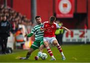 21 April 2023; Neil Farrugia of Shamrock Rovers in action against Adam Murphy of St Patrick's Athletic during the SSE Airtricity Men's Premier Division match between St Patrick's Athletic and Shamrock Rovers at Richmond Park in Dublin. Photo by Seb Daly/Sportsfile