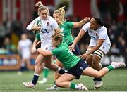 22 April 2023; Natasha Hunt of England is tackled by Dannah O'Brien of Ireland during the TikTok Women's Six Nations Rugby Championship match between Ireland and England at Musgrave Park in Cork. Photo by Eóin Noonan/Sportsfile