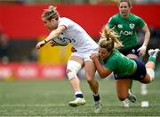 22 April 2023; Claudia MacDonald of England is tackled by Aoife Dalton of Ireland during the TikTok Women's Six Nations Rugby Championship match between Ireland and England at Musgrave Park in Cork. Photo by Eóin Noonan/Sportsfile