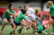 22 April 2023; Mackenzie Carson of England is tackled by Deirbhile Nic a Bháird of Ireland  during the TikTok Women's Six Nations Rugby Championship match between Ireland and England at Musgrave Park in Cork. Photo by Eóin Noonan/Sportsfile