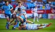 22 April 2023; Ruan Nortje of Vodacom Bulls is tackled by James Culhane and Max Deegan of Leinster during the United Rugby Championship match between Vodacom Bulls and Leinster at Loftus Versfeld Stadium in Pretoria, South Africa. Photo by Harry Murphy/Sportsfile