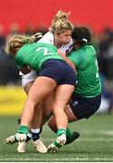 22 April 2023; Connie Powell of England is tackled by Neve Jones, left, and Christy Haney of Ireland during the TikTok Women's Six Nations Rugby Championship match between Ireland and England at Musgrave Park in Cork. Photo by Eóin Noonan/Sportsfile