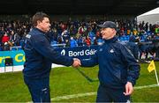 22 April 2023; Antrim manager Darren Gleeson, left, shakes hands with Dublin manager Micheál Donoghue after their side's draw in the Leinster GAA Hurling Senior Championship Round 1 match between Antrim and Dublin at Corrigan Park in Belfast. Photo by Ramsey Cardy/Sportsfile