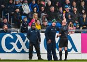 22 April 2023; Referee John Keenan shows a yellow card to Antrim manager Darren Gleeson during the Leinster GAA Hurling Senior Championship Round 1 match between Antrim and Dublin at Corrigan Park in Belfast. Photo by Ramsey Cardy/Sportsfile