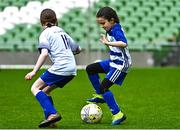 22 April 2023; Preet Singh of Homefarm FC, Dublin, in action against Rose Daly of Ballinahown FC, Westmeath, during the Aviva Soccer Sisters Finals Day at the Aviva Stadium in Dublin. Photo by Sam Barnes/Sportsfile