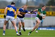 22 April 2023; Tadhg Morley of Kerry is tackled by Teddy Doyle of Tipperary during the Munster GAA Football Senior Championship Semi-Final match between Kerry and Tipperary at Fitzgerald Stadium in Killarney, Kerry. Photo by Brendan Moran/Sportsfile