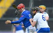 22 April 2023; Canice Maher of Cavan in action against Aaron Kenny, 6, and Conall McHugh of Monaghan during the Lory Meagher Cup Round 2 match between Cavan and Monaghan at Kingspan Breffni in Cavan. Photo by Stephen McCarthy/Sportsfile