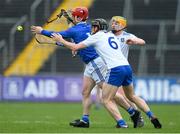 22 April 2023; Canice Maher of Cavan in action against Aaron Kenny, 6, and Conall McHugh of Monaghan during the Lory Meagher Cup Round 2 match between Cavan and Monaghan at Kingspan Breffni in Cavan. Photo by Stephen McCarthy/Sportsfile