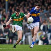 22 April 2023; Sean O'Shea of Kerry in action against Jack Kennedy of Tipperary during the Munster GAA Football Senior Championship Semi-Final match between Kerry and Tipperary at Fitzgerald Stadium in Killarney, Kerry. Photo by Brendan Moran/Sportsfile
