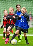 22 April 2023; Róise Gallagher of Kinvara United, Galway, in action against Siun Kelly of Mungret Regional FC, Limerick, during the Aviva Soccer Sisters Finals Day at the Aviva Stadium in Dublin. Photo by Sam Barnes/Sportsfile