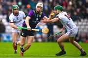 22 April 2023; Cathal Dunbar of Wexford in action against Brian Concannon of Galway during the Leinster GAA Hurling Senior Championship Round 1 match between Galway and Wexford at Pearse Stadium in Galway. Photo by Seb Daly/Sportsfile