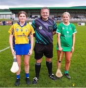 22 April 2023; Referee Gavin Donegan with Clare captain Aisling Moloney, left, and Limerick captain Lucy O'Brien before the Electric Ireland Camogie Minor A Shield Semi-Final match between Clare and Limerick at St Marys Hurling & Camogie Club in Clonmel, Tipperary. Photo by Michael P Ryan/Sportsfile