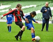 22 April 2023; Roisin Kumba of Dungarvan United, Waterford, in action against Sophie O'Halloran of Kilworth Celtic, Cork, during the Aviva Soccer Sisters Finals Day at the Aviva Stadium in Dublin. Photo by Sam Barnes/Sportsfile