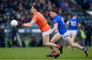 22 April 2023; Rory Grugan of Armagh in action against Ciarán Brady of Cavan during the Ulster GAA Football Senior Championship quarter-final match between Cavan and Armagh at Kingspan Breffni in Cavan. Photo by Stephen McCarthy/Sportsfile