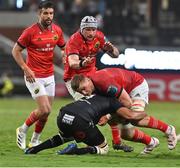 22 April 2023; Gavin Coombes of Munster is tackled during the United Rugby Championship match between Cell C Sharks and Munster at Hollywoodbets Kings Park Stadium in Durban, South Africa. Photo by Darren Stewart/Sportsfile