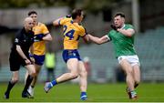 22 April 2023; Cathal O'Connor of Clare in action against Cathal Downes of Limerick  during the Munster GAA Football Senior Championship Semi-Final match between Limerick and Clare at TUS Gaelic Grounds in Limerick. Photo by Tom Beary/Sportsfile
