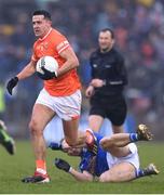 22 April 2023; Stefan Campbell of Armagh in action against Padraig Faulkner of Cavan during the Ulster GAA Football Senior Championship quarter-final match between Cavan and Armagh at Kingspan Breffni in Cavan. Photo by Stephen McCarthy/Sportsfile