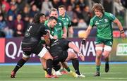 22 April 2023; Tiernan O'Halloran of Connacht is tackled by Lucio Sordoni, left, and Fraser Brown of Glasgow Warriors during the United Rugby Championship match between Glasgow Warriors and Connacht at Scotstoun Stadium in Glasgow, Scotland. Photo by Paul Devlin / Sportsfile