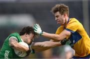 22 April 2023; Cian Sheehan of Limerick in action against Manus Doherty of Clare during the Munster GAA Football Senior Championship Semi-Final match between Limerick and Clare at TUS Gaelic Grounds in Limerick. Photo by Tom Beary/Sportsfile