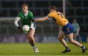 22 April 2023; Brian Donovan of Limerick  in action against Daniel Walsh of Clare during the Munster GAA Football Senior Championship Semi-Final match between Limerick and Clare at TUS Gaelic Grounds in Limerick. Photo by Tom Beary/Sportsfile