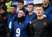 22 April 2023; Armagh substitutes including Rian O'Neill, right, stand for the playing of the National Anthem before the Ulster GAA Football Senior Championship quarter-final match between Cavan and Armagh at Kingspan Breffni in Cavan. Photo by Stephen McCarthy/Sportsfile